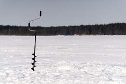 auger drilled into frozen pond